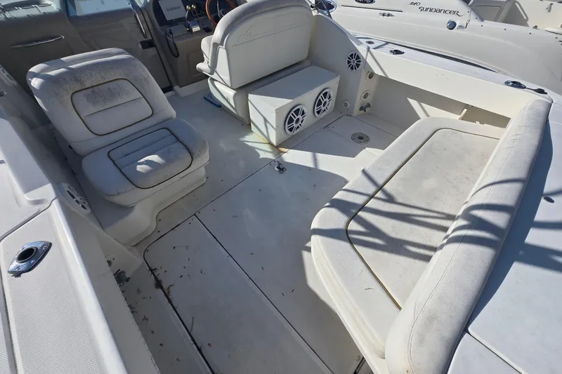 Slide: The Image of 2000 Sea Ray 290 Amberjack boat interior with seating and speakers. - 7