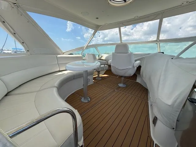 Slide: The Image of Interior of a 2005 Carver 46 Voyager yacht with luxurious seating. - 32