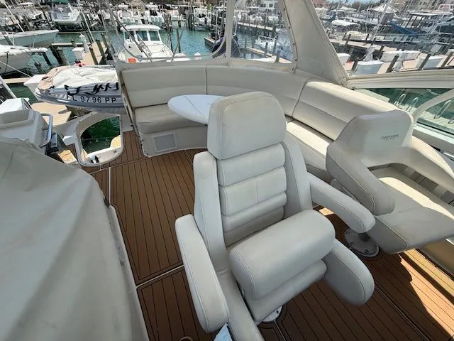 Slide: The Image of Interior of a 2005 Carver 46 Voyager yacht with luxurious seating. - 33