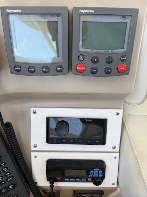 Slide: The Image of Navigation systems on a 2005 Carver 46 Voyager boat. - 39