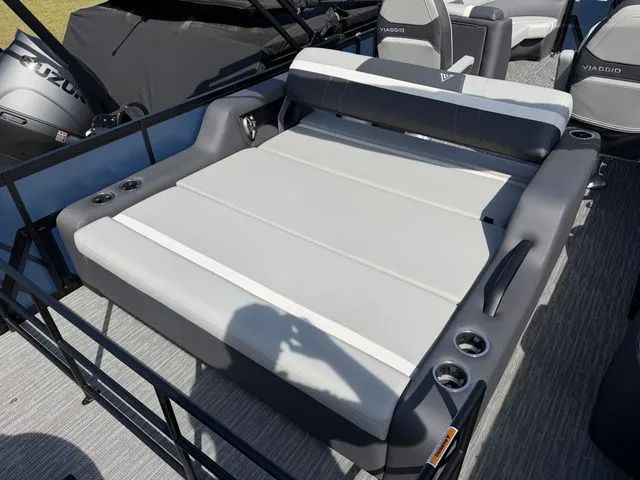 Slide: The Image of Viaggio Lago X-S 22 boat, 2026 model, gray lounge area with cup holders. - 3