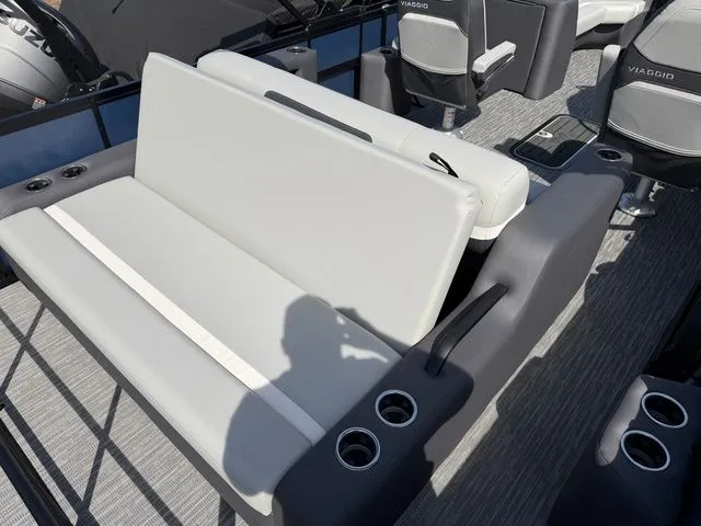 Slide: The Image of Interior of Viaggio Lago X-S 22 boat, gray seats, cup holders, year 2026. - 4