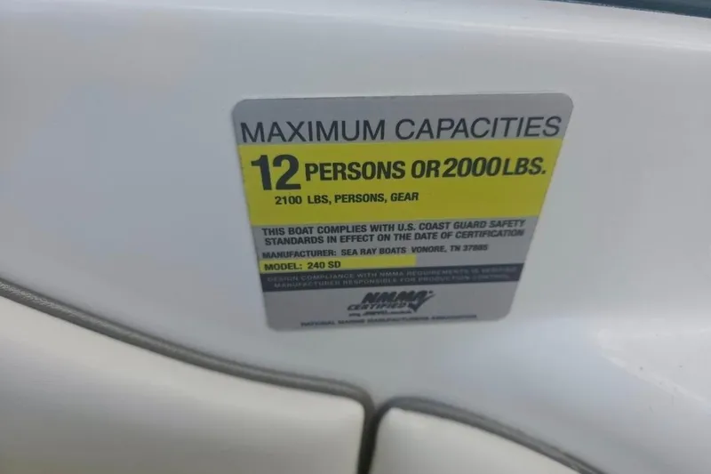 Slide: The Image of 2008 Sea Ray 240 Sundeck capacity label, maximum 12 persons or 2000 lbs. - 17
