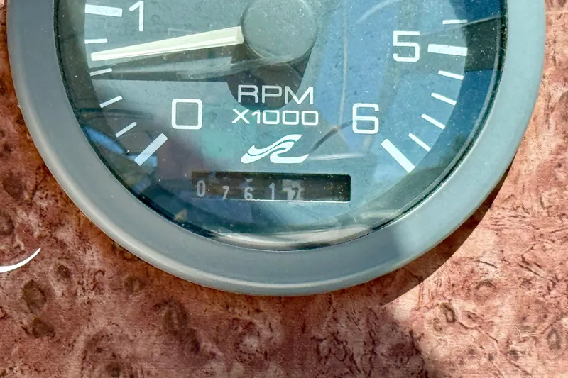 Slide: The Image of RPM gauge of 1996 Sea Ray 250 Sundancer showing 761.7 hours. - 13