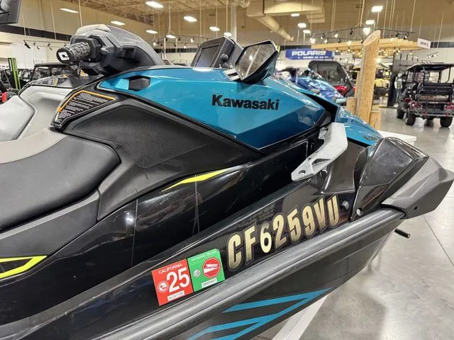 Slide: The Image of 2022 Kawasaki Ultra jet ski in a showroom. - 9