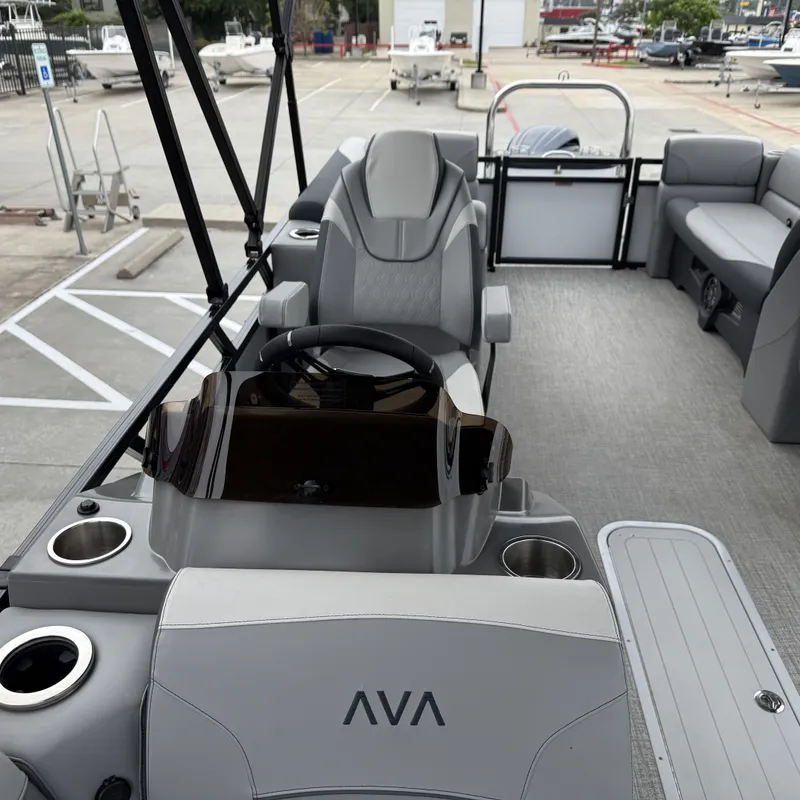 Slide: The Image of Interior of 2025 Avalon Venture 85 Quad Lounge with gray seating. - 12