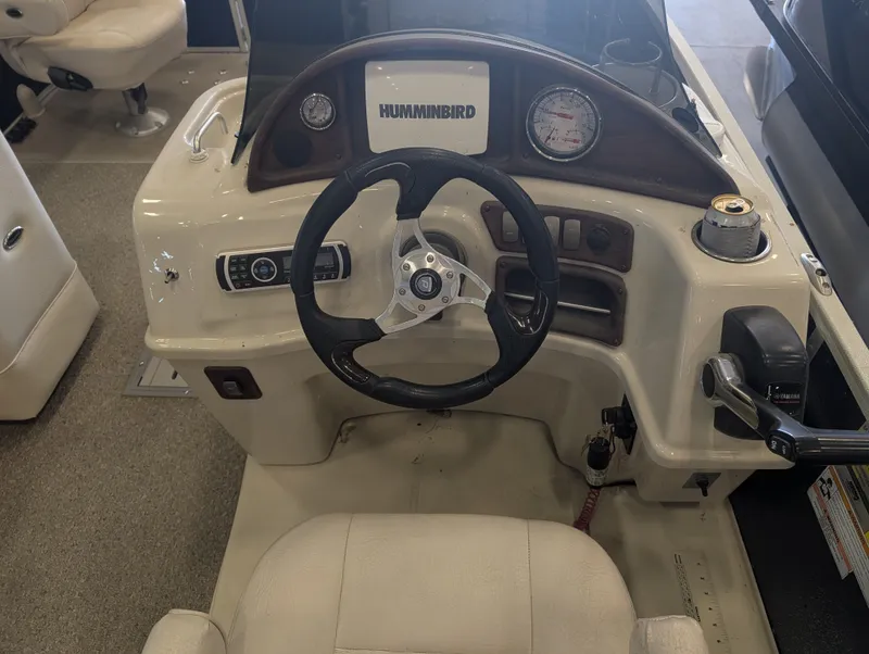 Slide: The Image of Helm console of a 2013 Premier 221 CASTAWAY RE boat. - 8