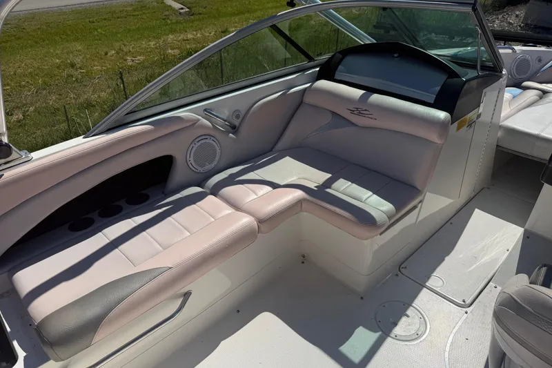 Slide: The Image of 2006 MasterCraft X-15 boat interior with cushioned seating and sleek design. - 12