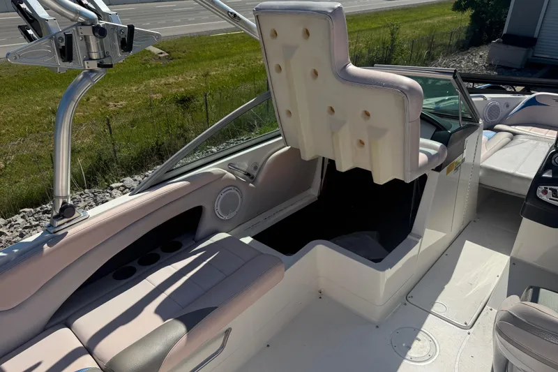 Slide: The Image of 2006 MasterCraft X-15 boat interior with seating and steering area, featuring sleek design elements. - 15