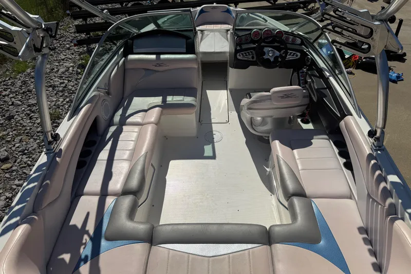 Slide: The Image of 2006 MasterCraft X-15 boat interior with spacious seating and modern dashboard. - 20