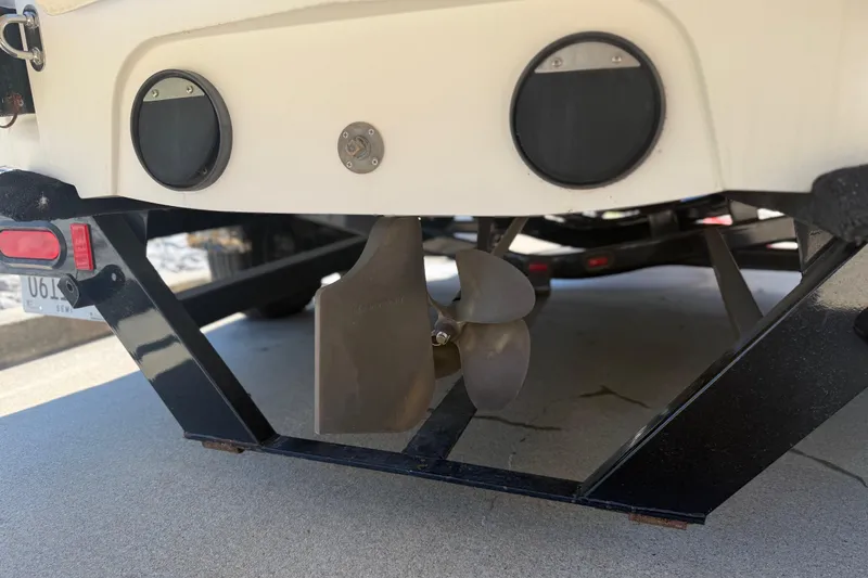 Slide: The Image of Rear view of a 2006 MasterCraft X-15 boat showing propeller and trailer. - 23