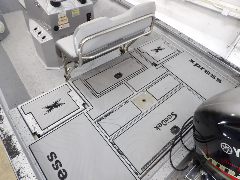 Slide: The Image of Interior of a 2019 Xpress H20B Bay boat with Yamaha engine. - 17