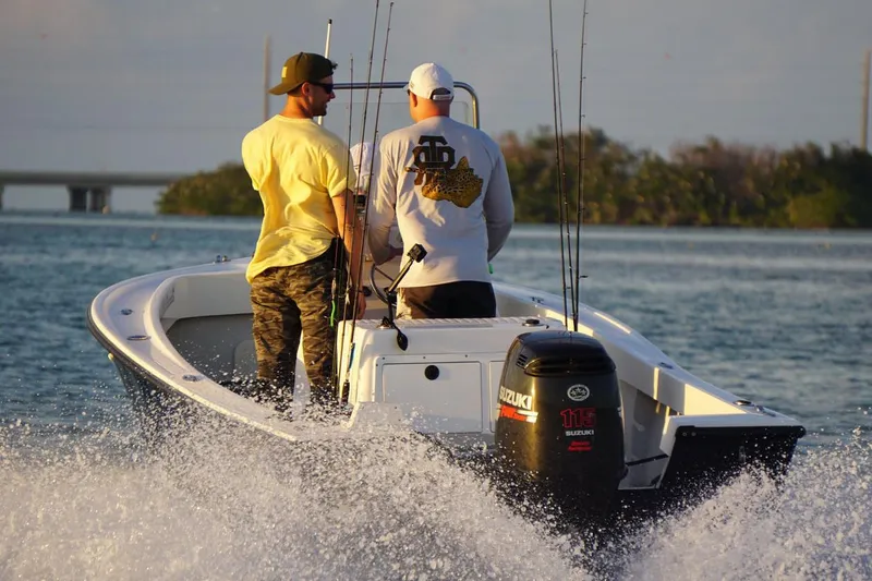 Slide: The Image of Manufacturer Provided Image: 2026 NorthCoast 190 Center Console boat with two people fishing on open water. - 13