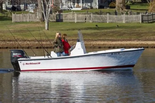 Slide: The Image of Manufacturer Provided Image: 2026 NorthCoast 190 Center Console boat on a calm lake with two people onboard. - 14