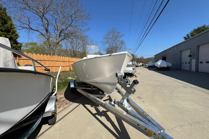 Slide: The Image of 2026 NorthCoast 190 Center Console on trailer outdoors. - 8