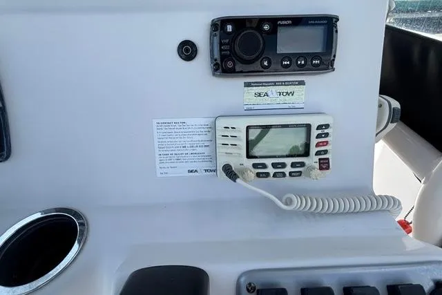 Slide: The Image of Control panel of a 2011 Starcraft Star Step 229 CC OB boat with radio and navigation equipment. - 20