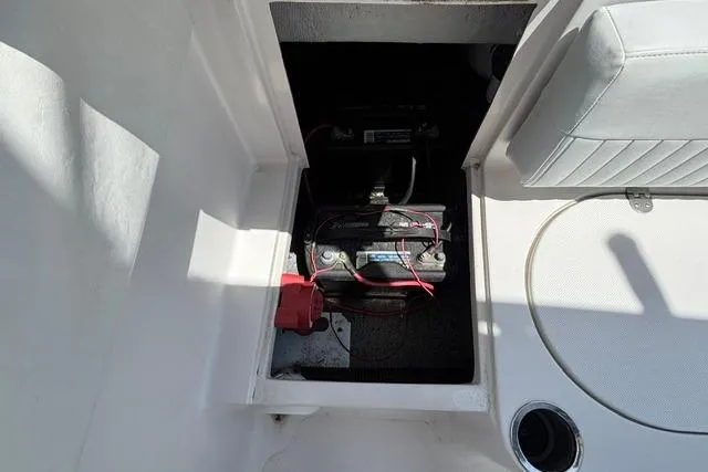 Slide: The Image of Battery compartment of 2011 Starcraft Star Step 229 CC OB boat. - 23