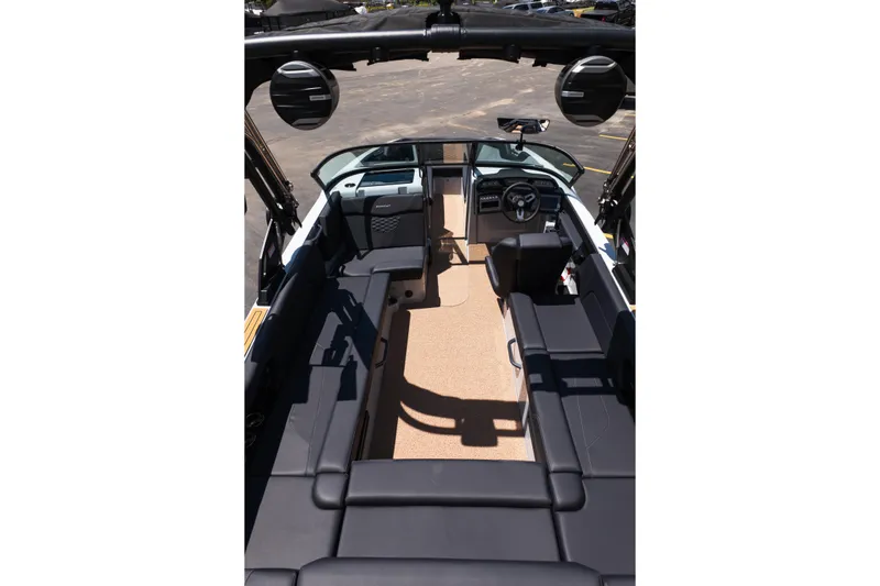 Slide: The Image of Interior view of 2026 MasterCraft NXT24 boat with sleek seating and modern dashboard. - 12