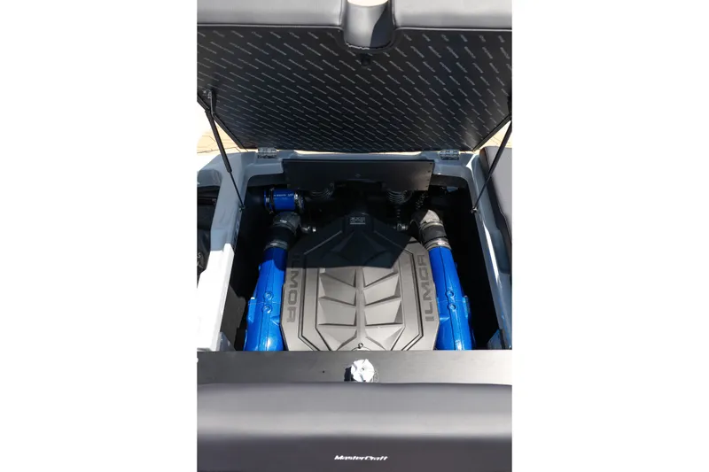Slide: The Image of 2026 MasterCraft NXT24 engine compartment with Ilmor components visible. - 19