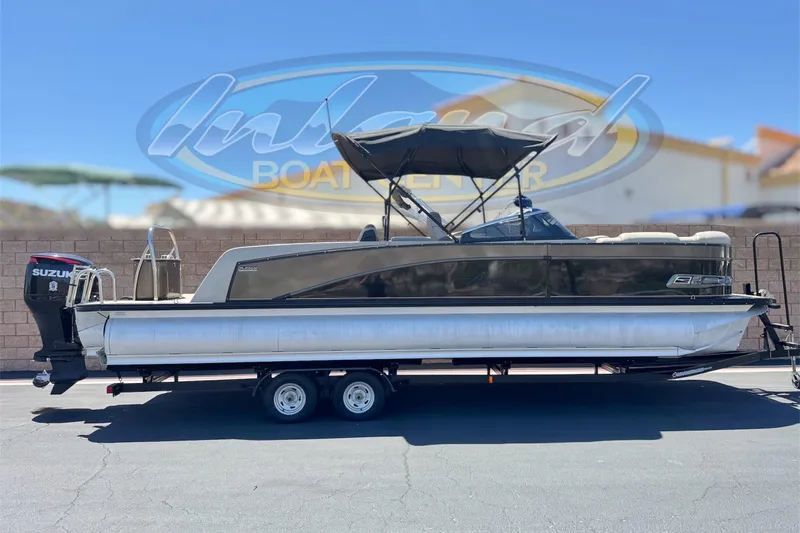 The Image of 2023 Avalon Catalina VRBW pontoon boat with Suzuki outboard motor on trailer. - 0
