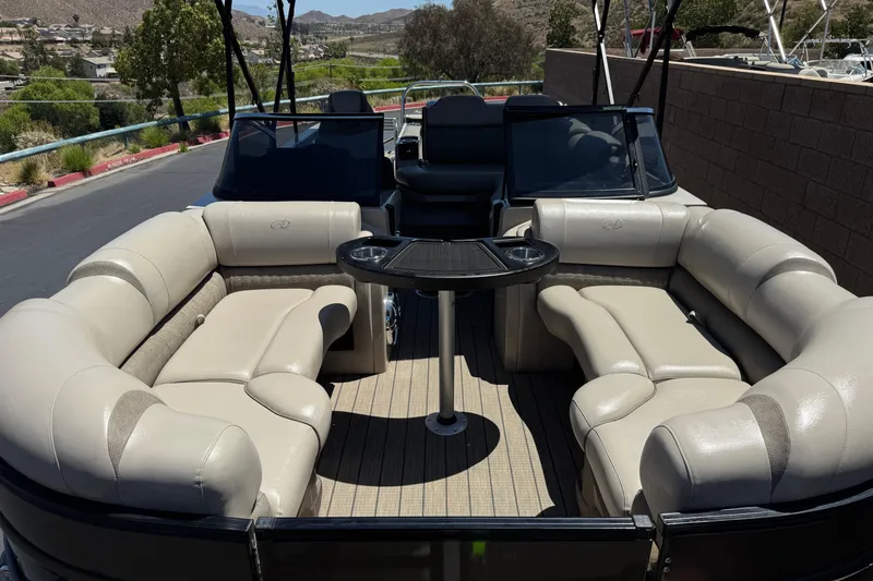 Slide: The Image of 2023 Avalon Catalina VRBW boat with luxurious seating and sleek design. - 10