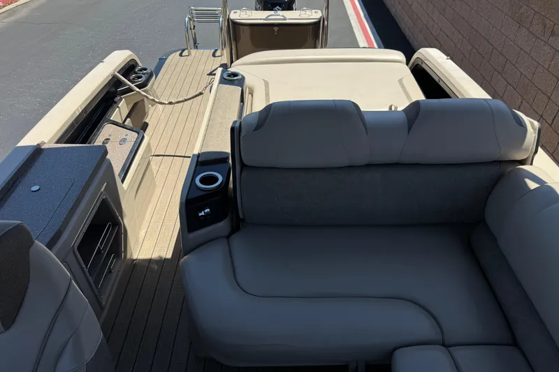 Slide: The Image of 2023 Avalon Catalina VRBW pontoon boat interior with plush seating and cup holders. - 15