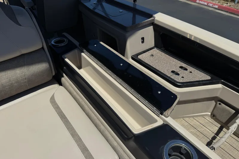 Slide: The Image of Interior of 2023 Avalon Catalina VRBW boat with seating and storage compartments. - 22