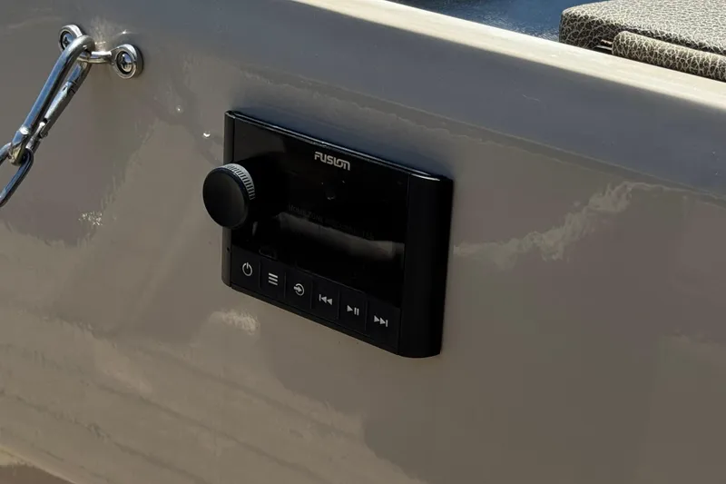 Slide: The Image of 2023 Avalon Catalina VRBW boat with Fusion audio control panel. - 23