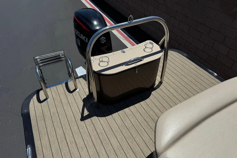 Slide: The Image of 2023 Avalon Catalina VRBW boat deck with Suzuki outboard motor and ladder. - 28
