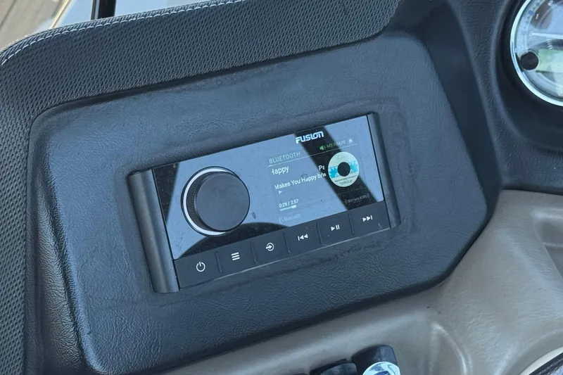 Slide: The Image of 2023 Avalon Catalina VRBW dashboard with Fusion Bluetooth audio system display. - 34