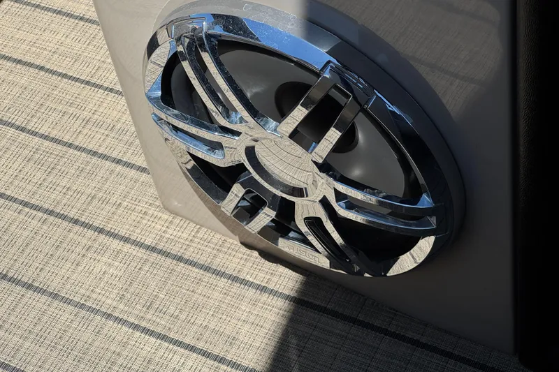 Slide: The Image of Close-up of a chrome speaker on a 2023 Avalon Catalina VRBW boat. - 36