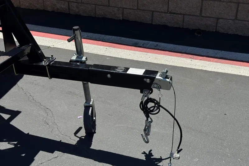 Slide: The Image of Trailer hitch and jack stand of 2023 Avalon Catalina VRBW on pavement. - 38