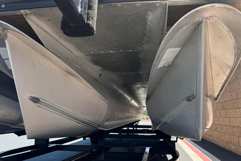 Slide: The Image of Underneath view of a 2023 Avalon Catalina VRBW pontoon boat on a trailer. - 4