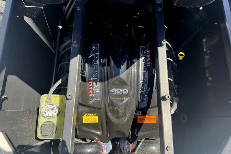 Slide: The Image of Engine compartment of a 2015 Tigé Z1 boat, featuring a powerful 400 horsepower motor. - 5