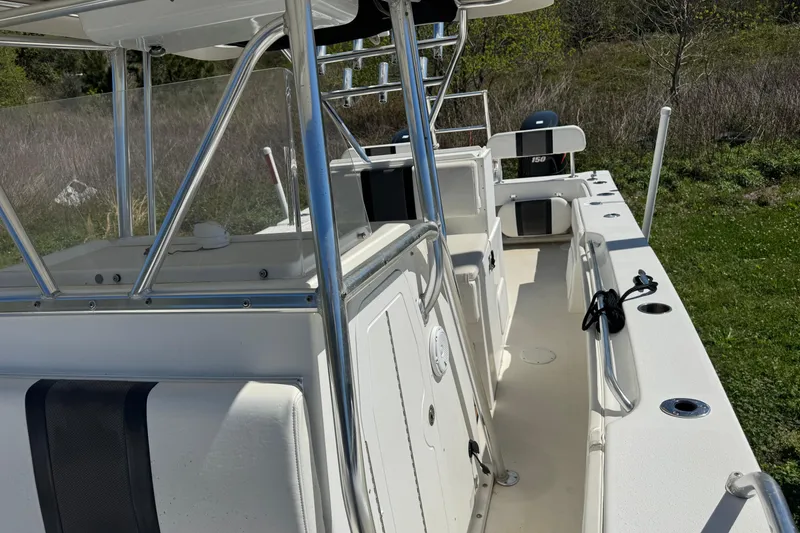 Slide: The Image of 2016 Twin Vee 26 Center Console boat with sleek design and spacious deck. - 11