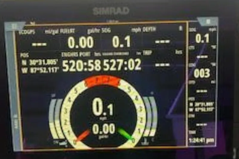 Slide: The Image of Simrad marine display on 2016 Twin Vee 26 Center Console, showing navigation and engine data. - 9