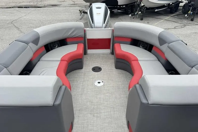 Slide: The Image of 2022 Trifecta SS 23RF pontoon boat with red and gray seating arrangement. - 6