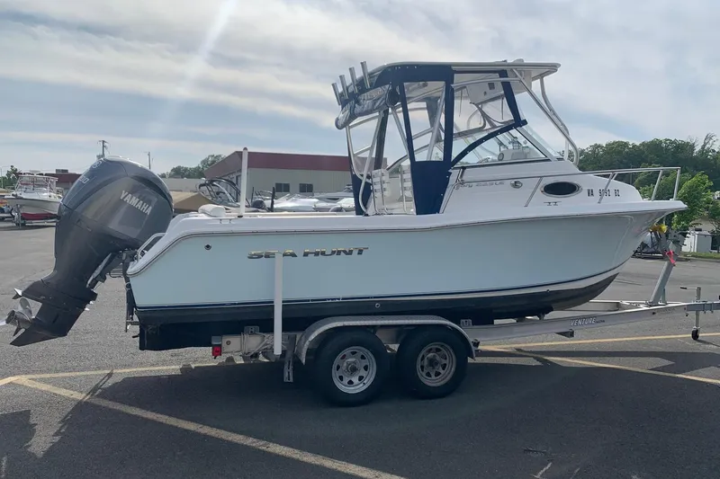 Slide: The Image of 2014 Sea Hunt Victory 225 boat on trailer with Yamaha outboard motor. - 3