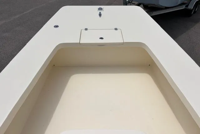 Slide: The Image of 2026 Jones Brothers Bateau 20 boat interior, showcasing spacious deck and storage compartment. - 3