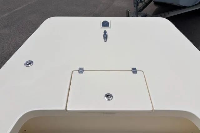 Slide: The Image of 2026 Jones Brothers Bateau 20 boat deck with storage compartment and latch. - 4