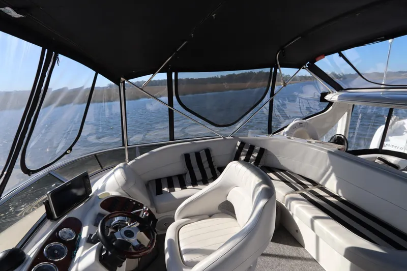 Slide: The Image of Luxurious 2005 Meridian 459 Motoryacht interior with plush seating and panoramic views. - 27