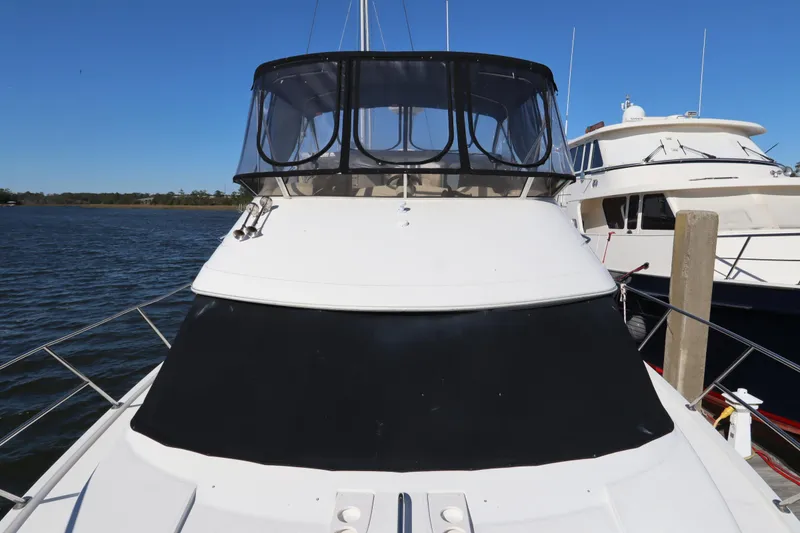 Slide: The Image of 2005 Meridian 459 Motoryacht docked on a sunny day. - 3