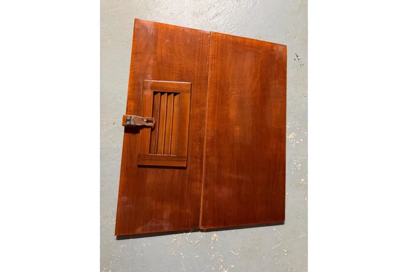 Slide: The Image of Wooden door panel with vent and latch, PAC 23 model, 1976. - 14