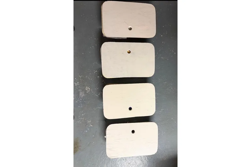 Slide: The Image of Four rectangular wooden boards with holes, PAC 23 model, 1976. - 21