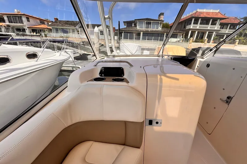 Slide: The Image of Interior view of 2014 Grady-White Freedom 335 boat docked at marina. - 32