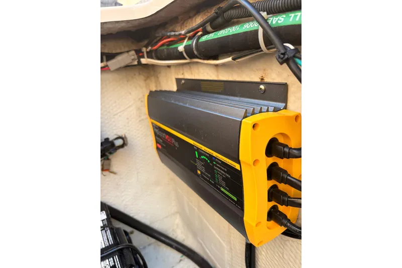Slide: The Image of Battery charger installed on a 2014 Grady-White Freedom 335 boat. - 46
