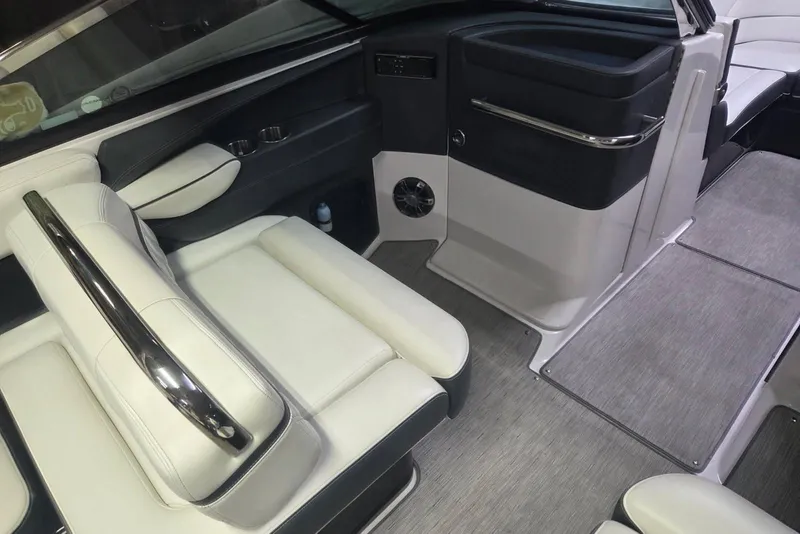 Slide: The Image of Interior of 2019 Regal 29 OBX boat with sleek seating and modern design. - 10