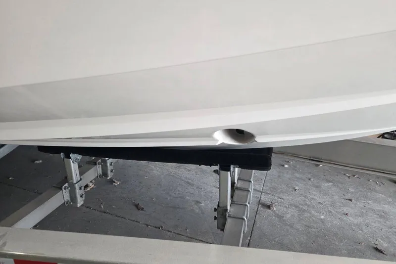 Slide: The Image of 2019 Regal 29 OBX boat hull on trailer, showcasing sleek design and craftsmanship. - 19