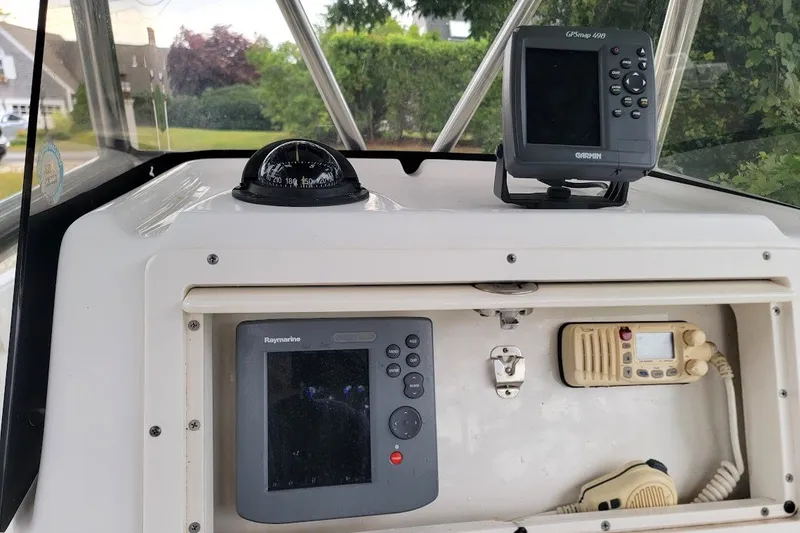 Slide: The Image of 2004 Century 2200 Center Console dashboard with navigation and communication equipment. - 3