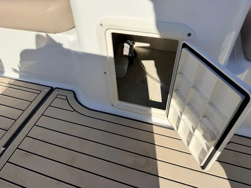 Slide: The Image of Hurricane Fun Deck 198 boat with open storage compartment, 2021 model. - 11